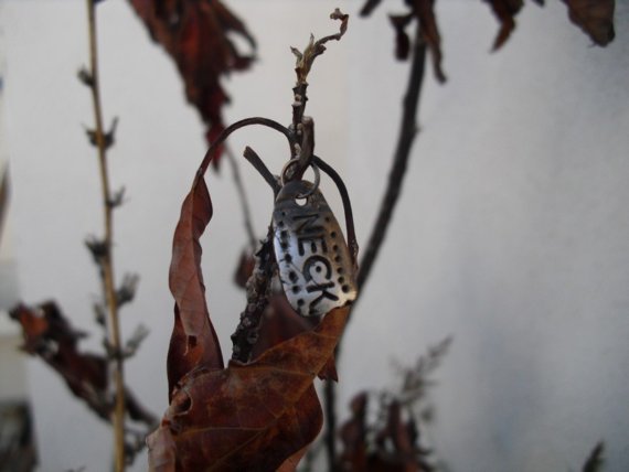 Pendant with "NECK" inscription (oxidized pure silver)